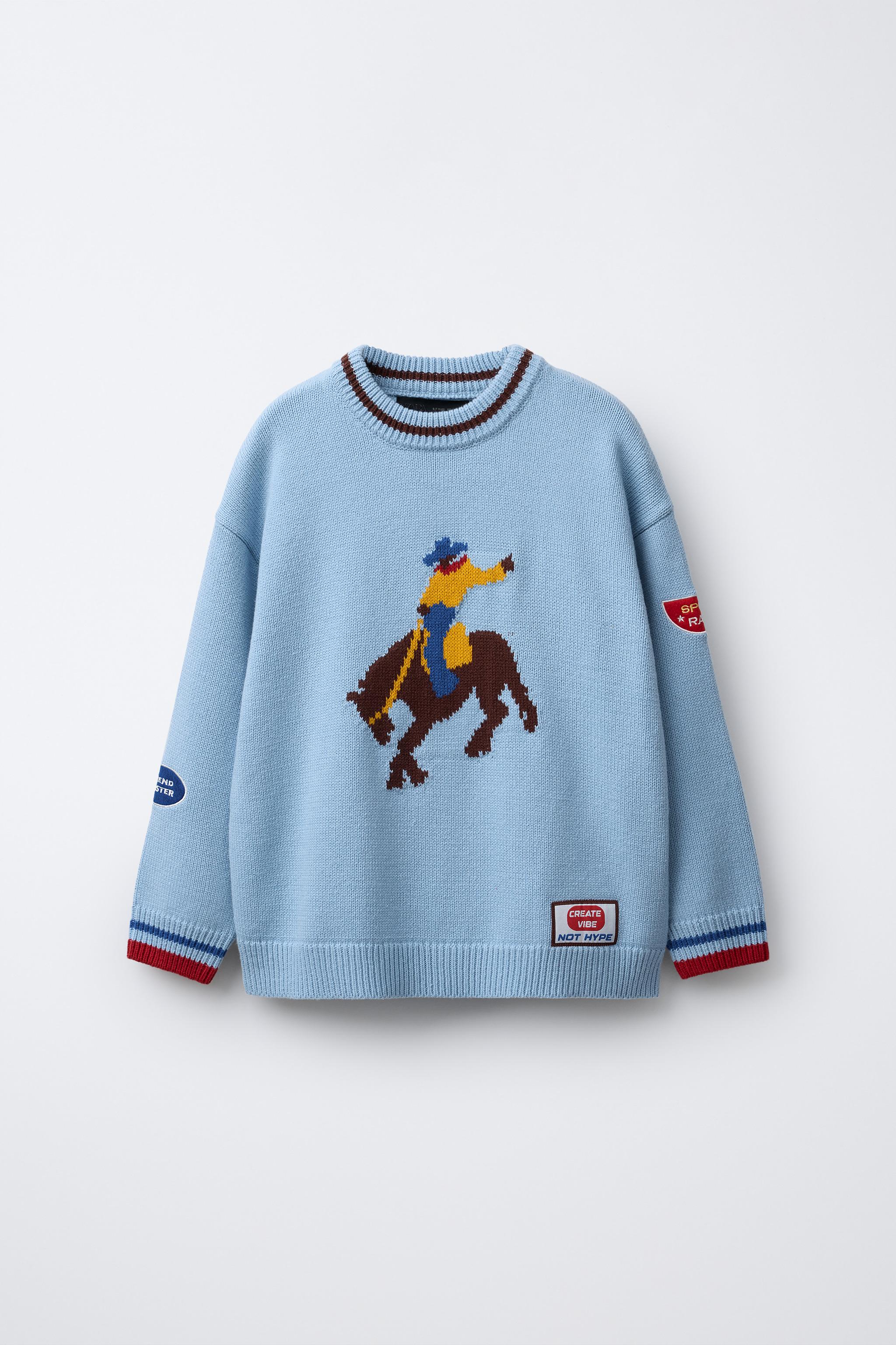 PULL EN MAILLE BRODÉ ET À PIÈCES